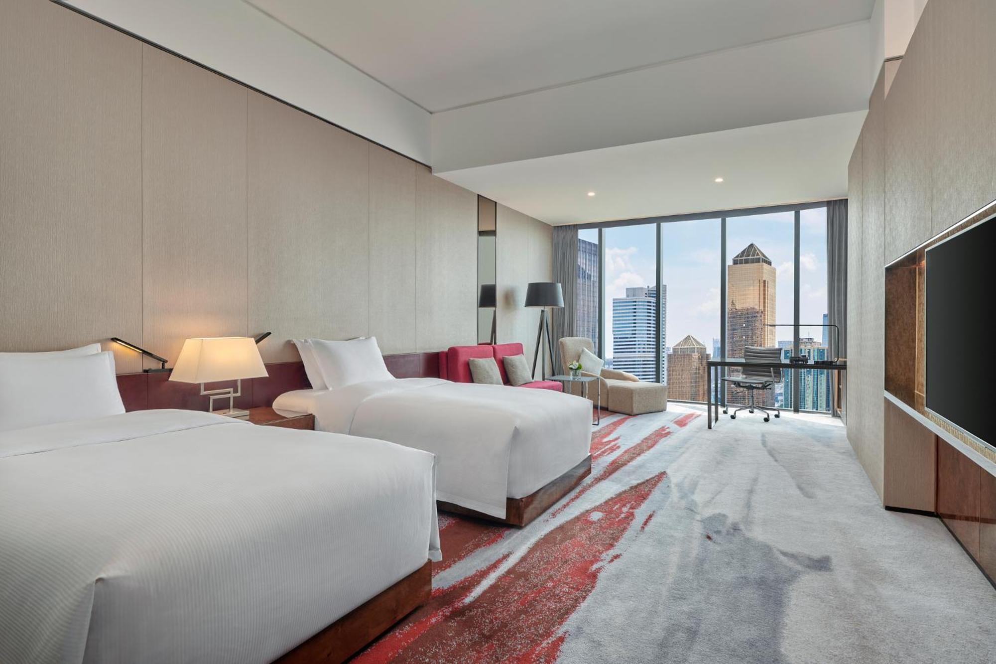 Hilton Guangzhou Tianhe - Free Shuttle Bus And Registration Counter Available During Canton Fair Period Bagian luar foto Deluxe Room